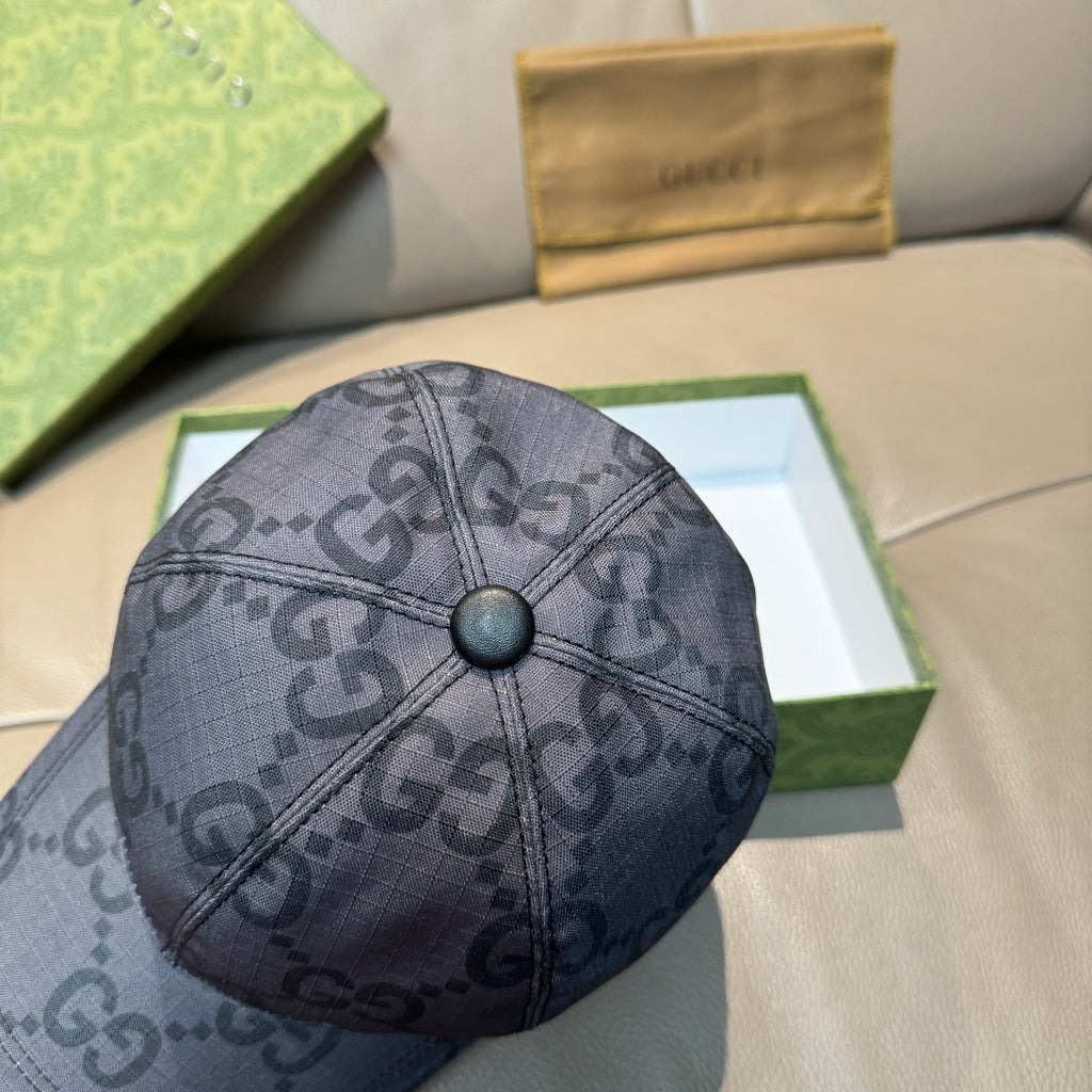 Gucci GG-pattern baseball cap, dark gray, top view with central button