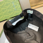 Gucci baseball cap interior with adjustable strap and size label, dark gray
