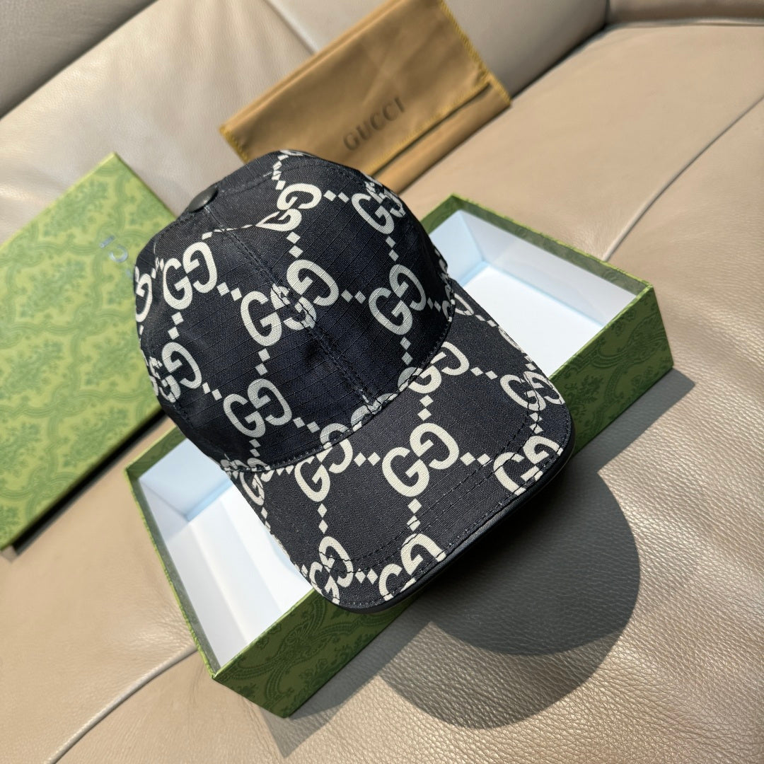 Gucci baseball cap in black with allover GG monogram pattern and curved brim