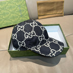 Gucci baseball cap side view in black with white GG monogram pattern and brim