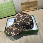 Gucci GG monogram baseball cap with dark brown and tan allover print