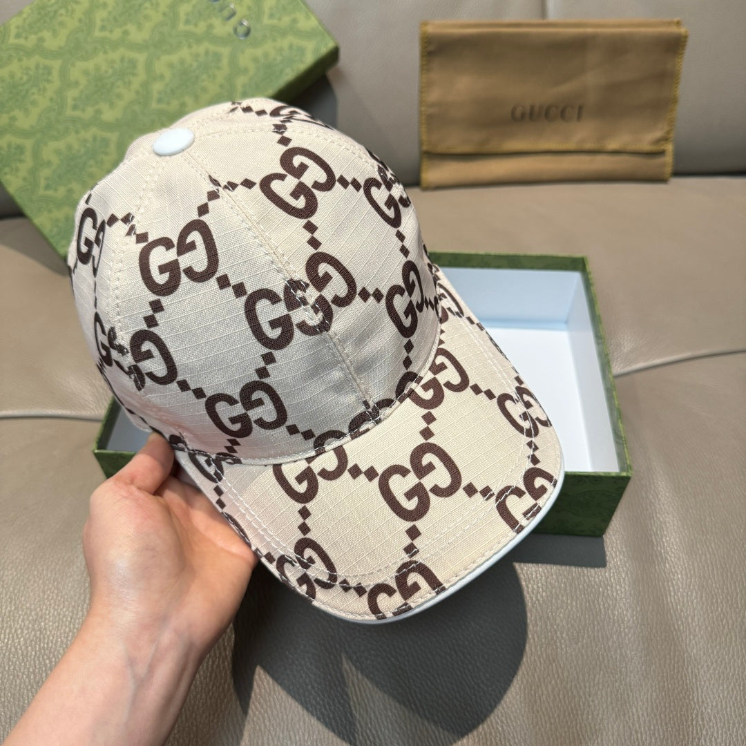 Gucci baseball cap with white GG monogram print and light blue top button