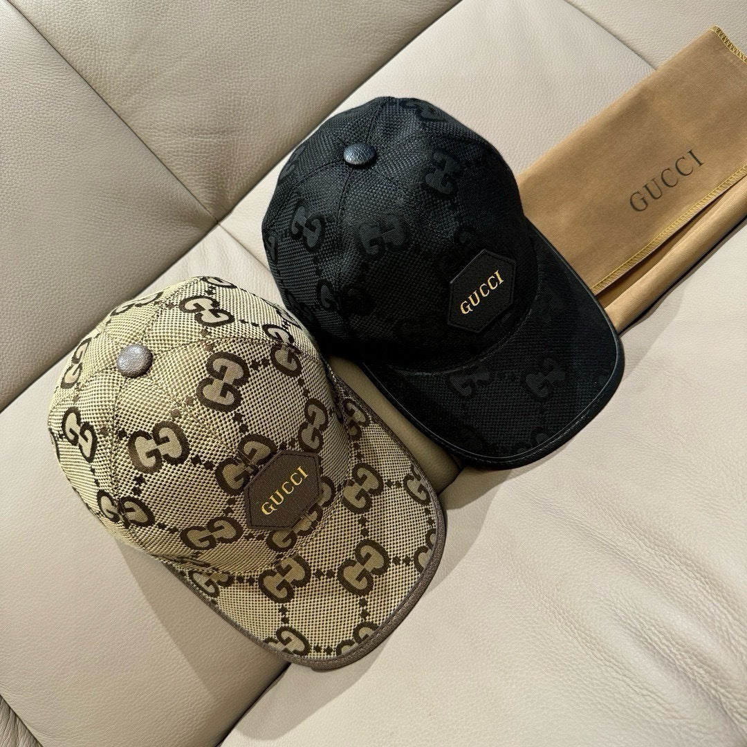 Gucci cap set: beige and black GG monogram caps with curved brims.