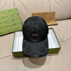 Gucci black monogram baseball cap with curved brim and side logo patch