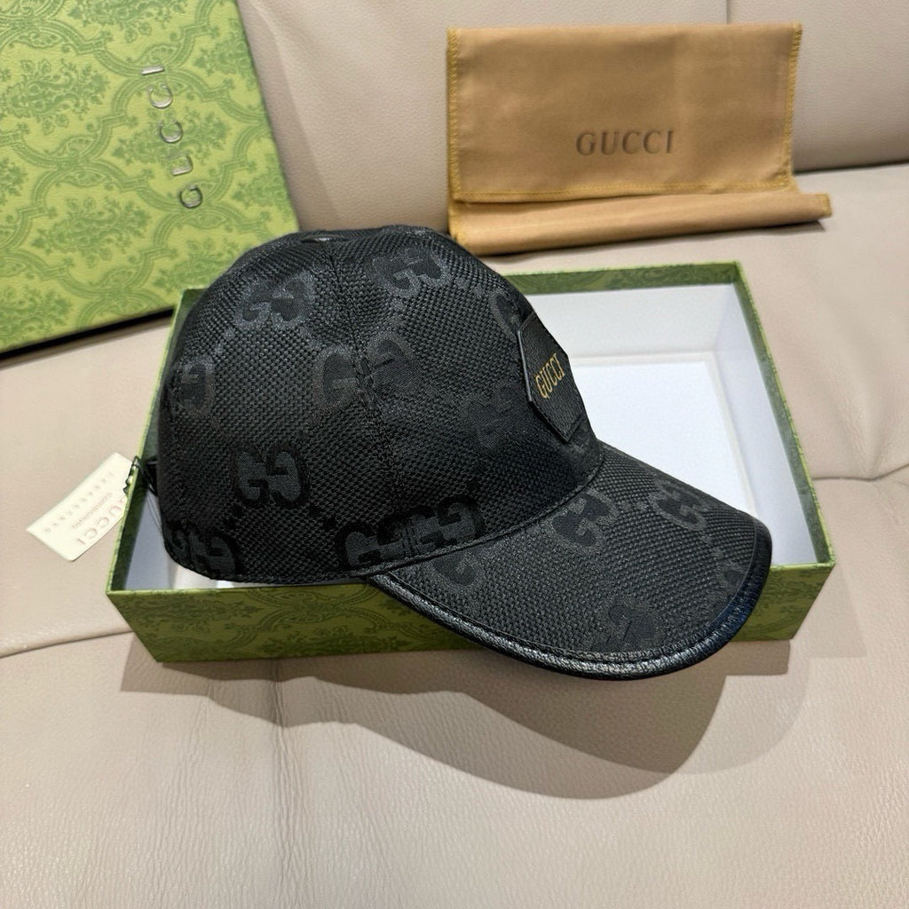 Black baseball cap with all-over monogram pattern and side logo patch