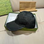 Black monogram baseball cap with curved brim and side panel logo patch