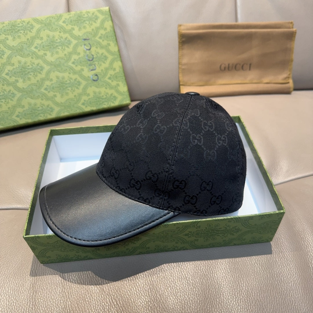 Black Gucci cap with GG monogram pattern and curved brim, side view