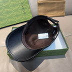 Black Gucci cap interior view with adjustable strap and stitched lining