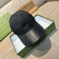 Gucci baseball cap in dark gray with repeating GG monogram pattern