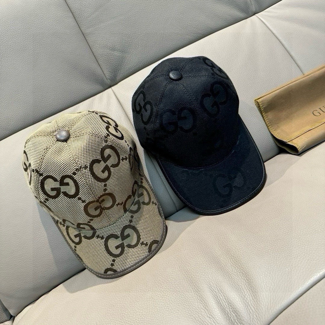Gucci two baseball caps: black and beige GG-pattern with curved brims