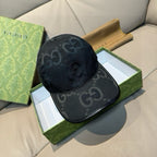 Gucci black GG-pattern baseball cap with curved brim and snapback strap