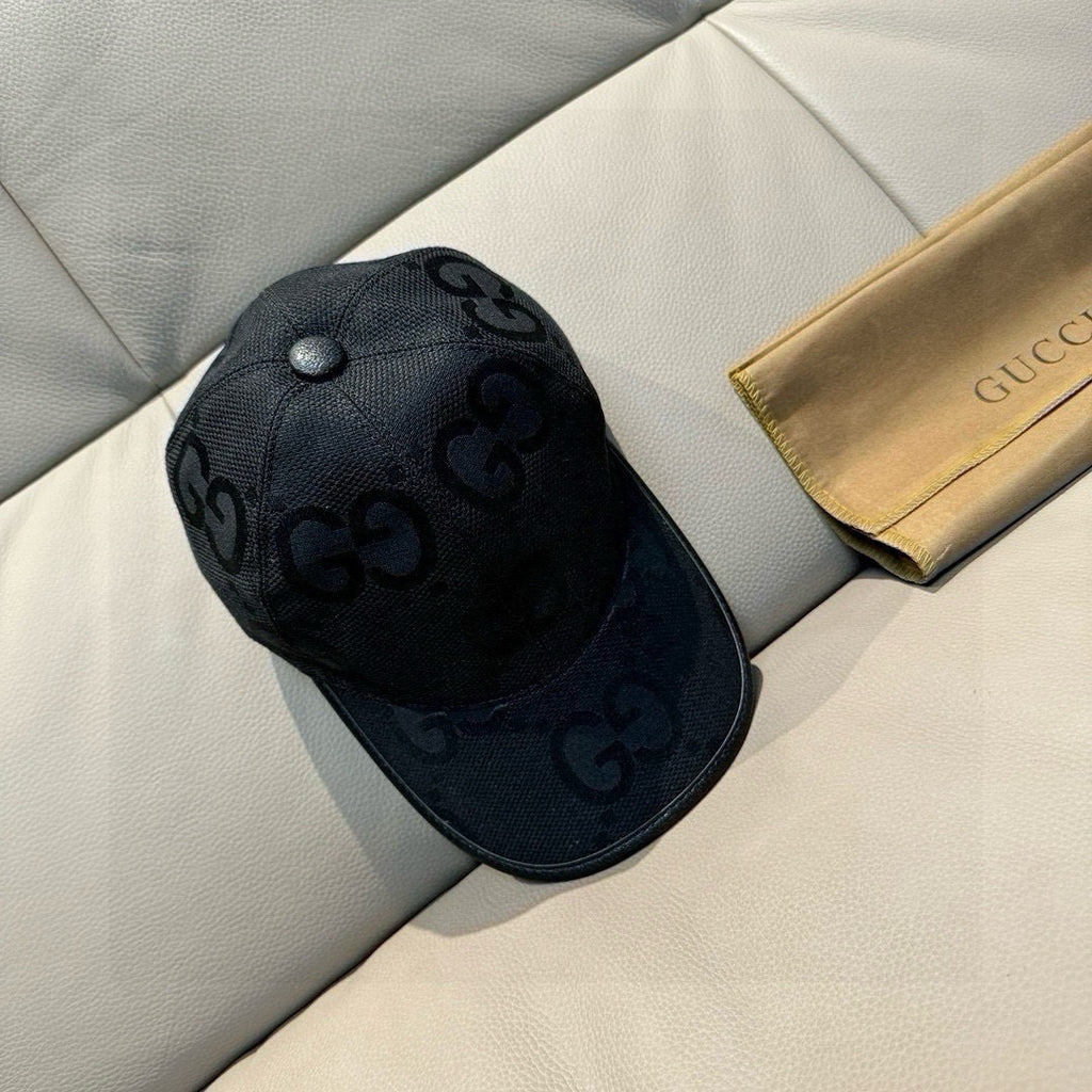 Gucci black GG-pattern baseball cap with domed crown and curved brim