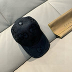 Gucci black GG-pattern baseball cap with domed crown and curved brim