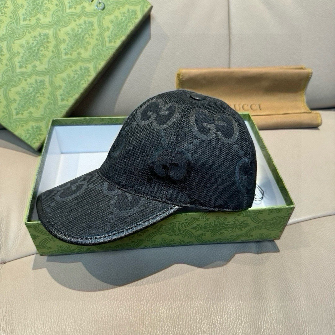 Gucci black GG-pattern baseball cap, front view with small round crown button