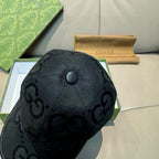 Gucci black GG monogram baseball cap, crown close-up with center button