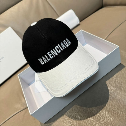 Two-tone baseball cap with Balenciaga logo on black crown and white brim