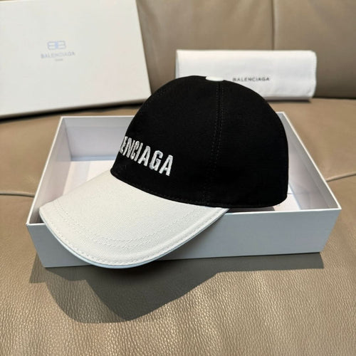 Two-tone baseball cap with Balenciaga logo patch on black crown and white brim
