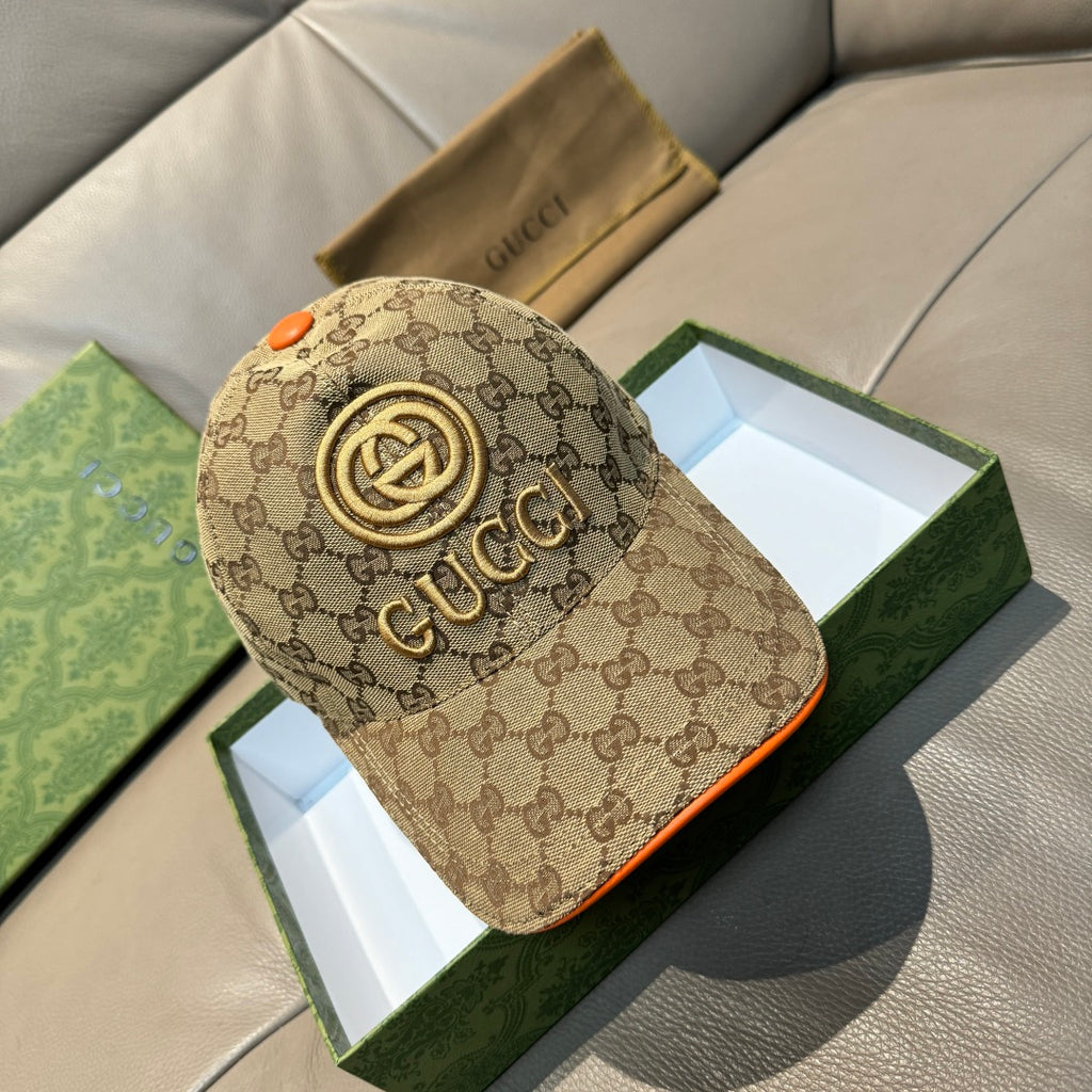 Gucci baseball cap in beige GG canvas with gold logo, orange button, and orange-trim brim