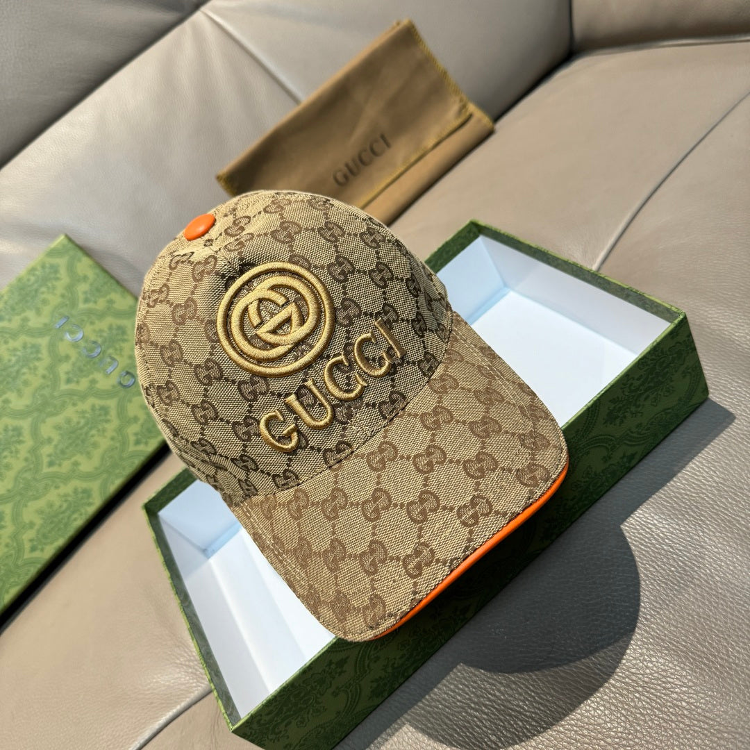 Gucci baseball cap in beige GG canvas with gold logo, orange button, and orange-trim brim