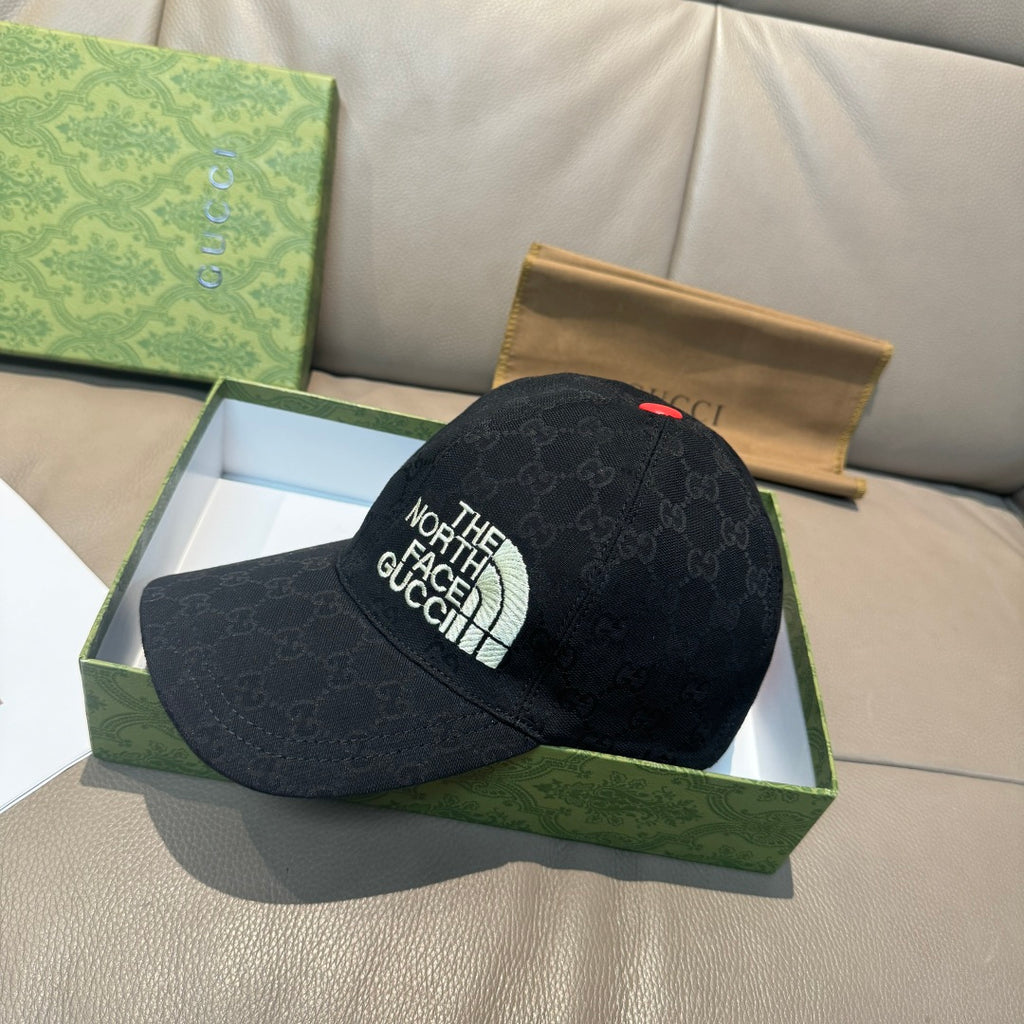 Black baseball cap with side The North Face Gucci logo and small red top button