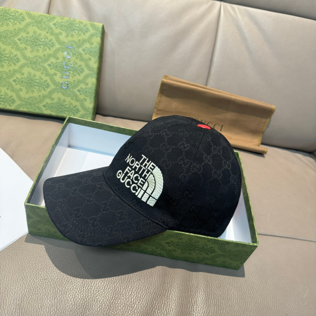 Black baseball cap with side The North Face Gucci logo and small red top button