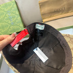 Black-lined cap interior with red strap detail and “Gucci” size tag