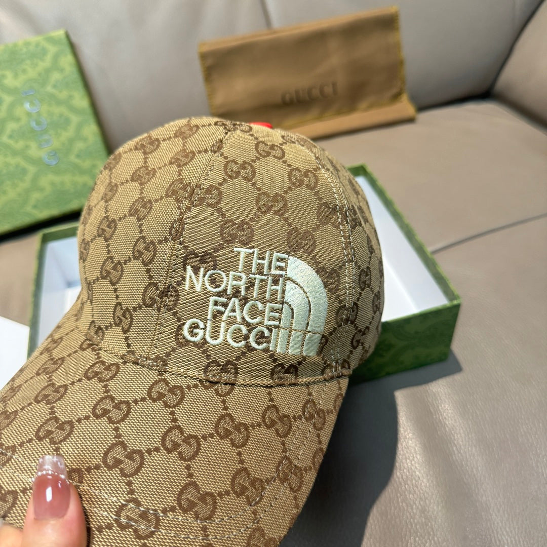 Beige GG monogram baseball cap with teal “THE NORTH FACE” patch on front