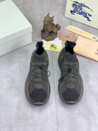 Burberry lace-up knit sneakers, dark plaid upper with blue details, shown pair view