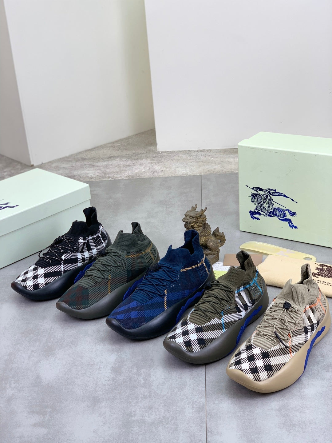 Burberry knit sneakers set: dark plaid, blue, and tan checked styles with elastic collars