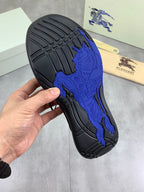 Burberry sneaker outsole tread with blue midsole and black rubber pattern
