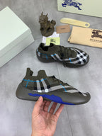 Burberry knit sneakers, dark olive with black-and-white check and blue accent stripe