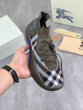 Burberry knit sneakers in dark gray/olive with black-and-white check and blue accents