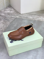 Burberry brown leather boat shoe with lace-up eyelets and cushioned lining opening