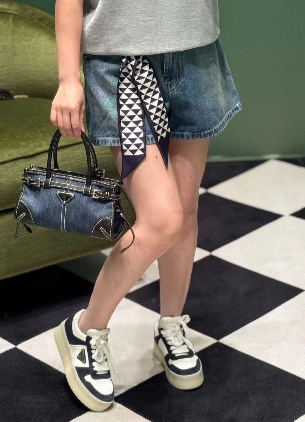 Denim Prada handbag with top handles and front triangle logo