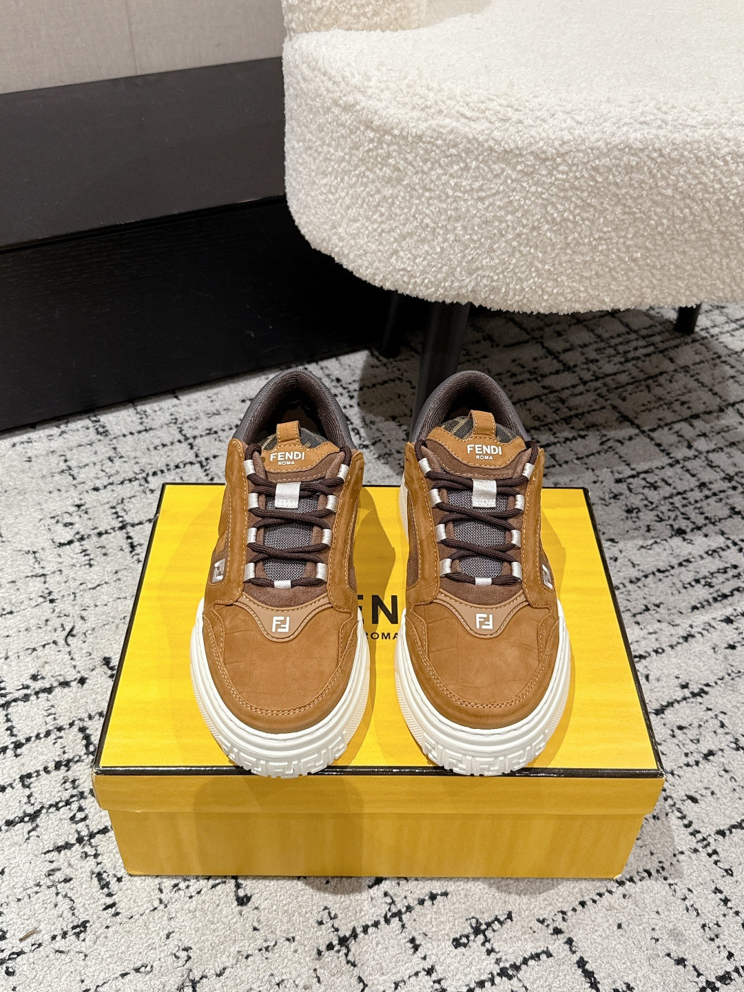 Fendi unisex lace-up sneakers in tan with white rubber sole and dark lace trim