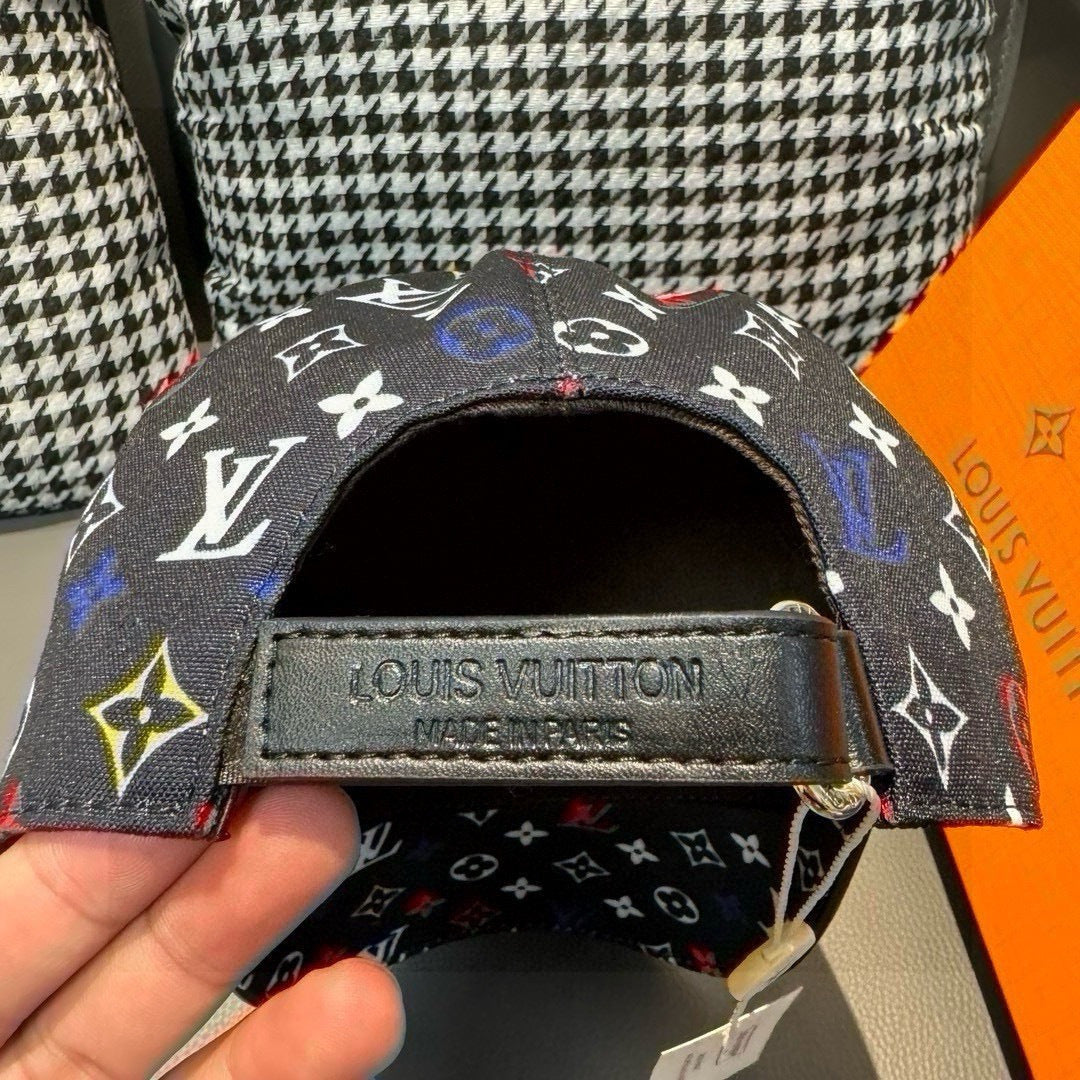 Louis Vuitton cap label, black interior patch and multicolor monogram print crown.