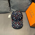 Louis Vuitton cap, black monogram pattern with multicolor symbols and curved brim.