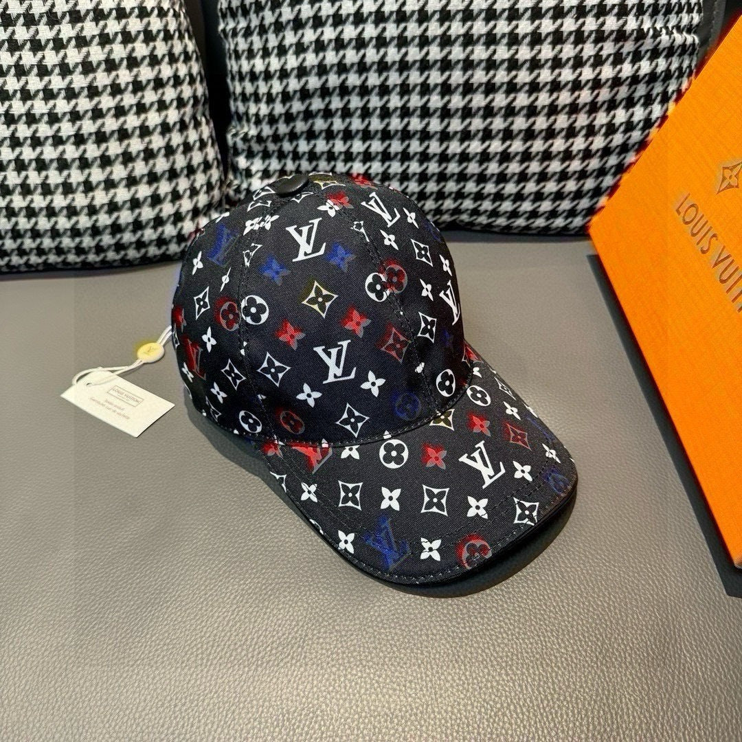 Louis Vuitton cap, black monogram pattern with multicolor symbols, front-right view.
