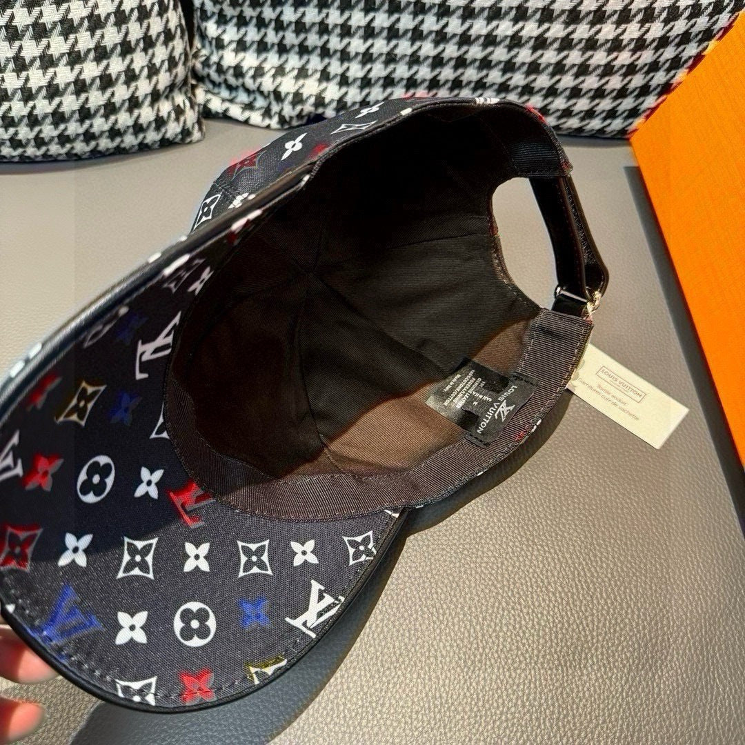 Louis Vuitton cap interior, black lining with multicolor monogram print on crown.