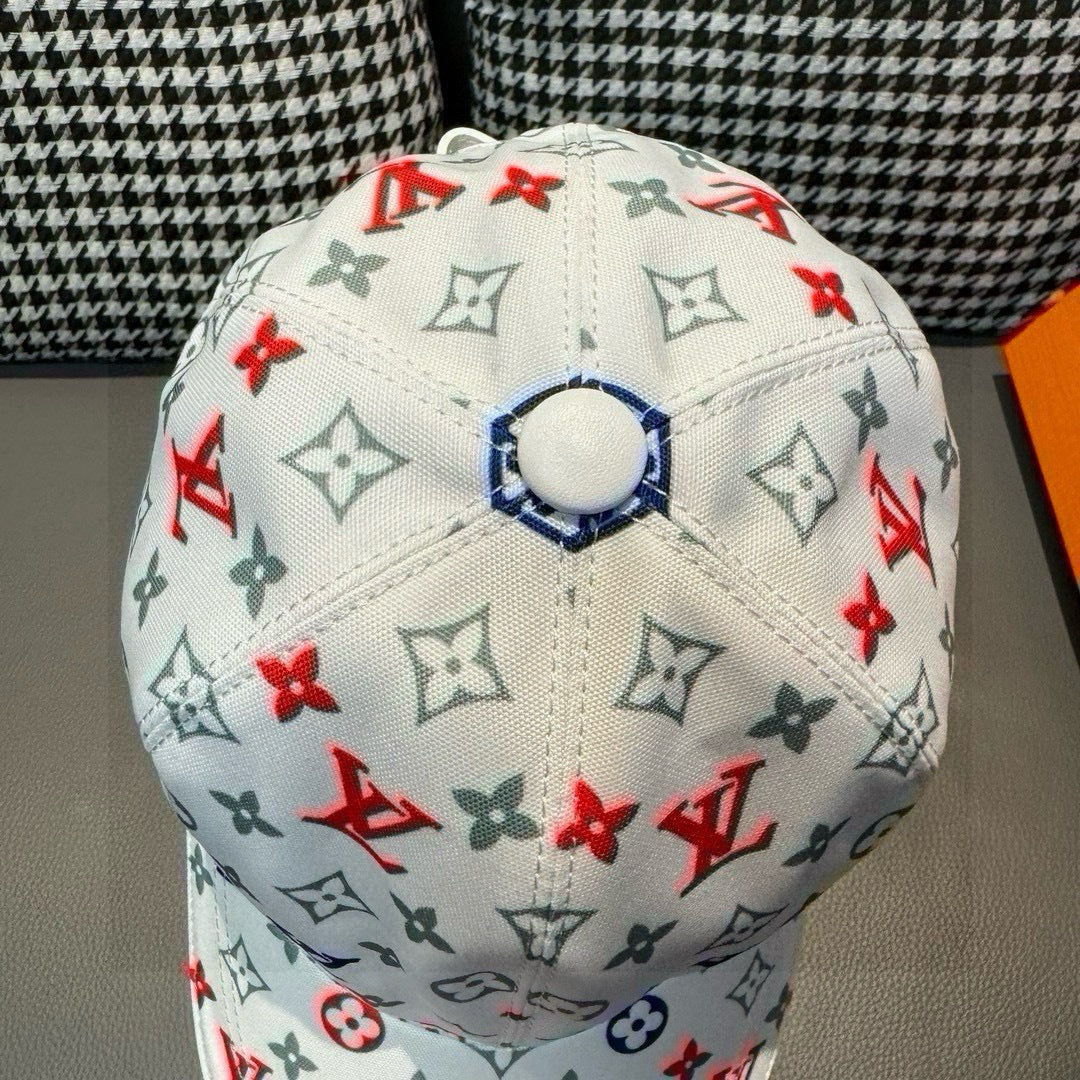 White baseball cap top view with round button detail and monogram pattern.