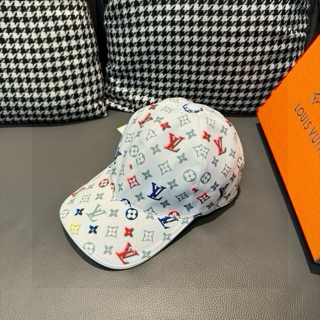 White baseball cap with colorful monogram logo print and curved brim.