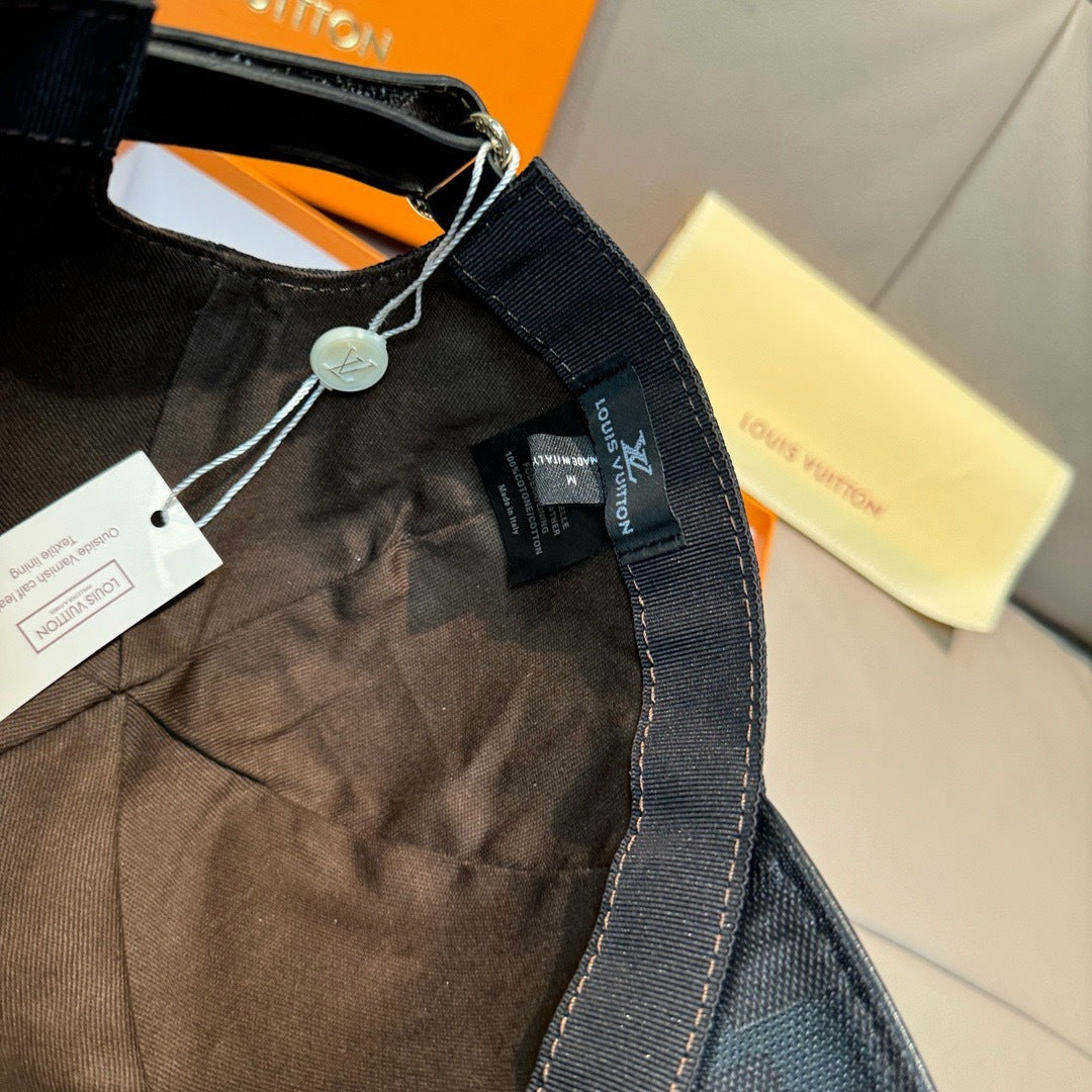 Louis Vuitton black cap close-up of adjustable strap and hanging tag