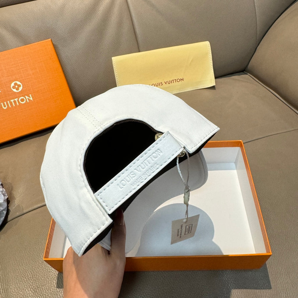 White baseball cap interior view with stitched logo strap detail