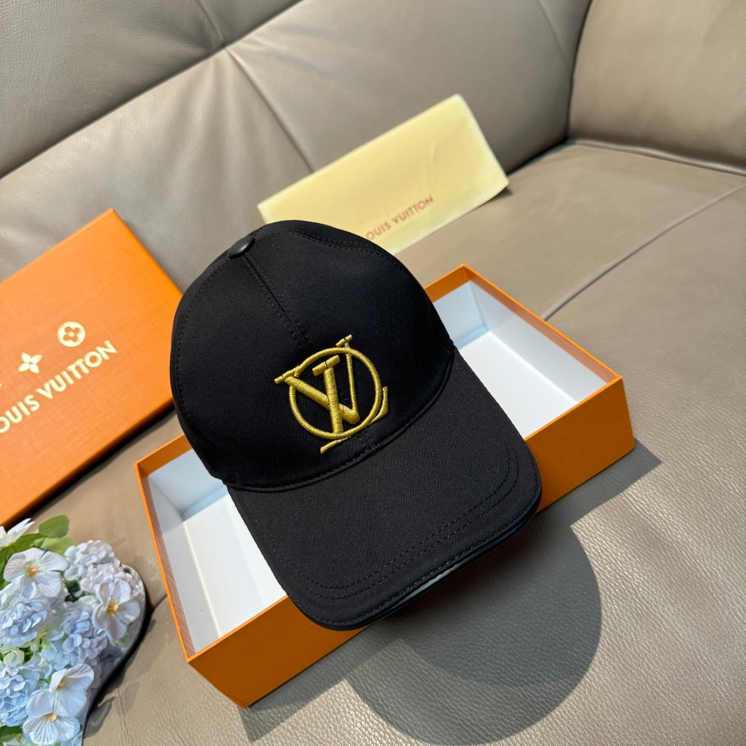 Louis Vuitton black baseball cap with gold LV logo on the front panel