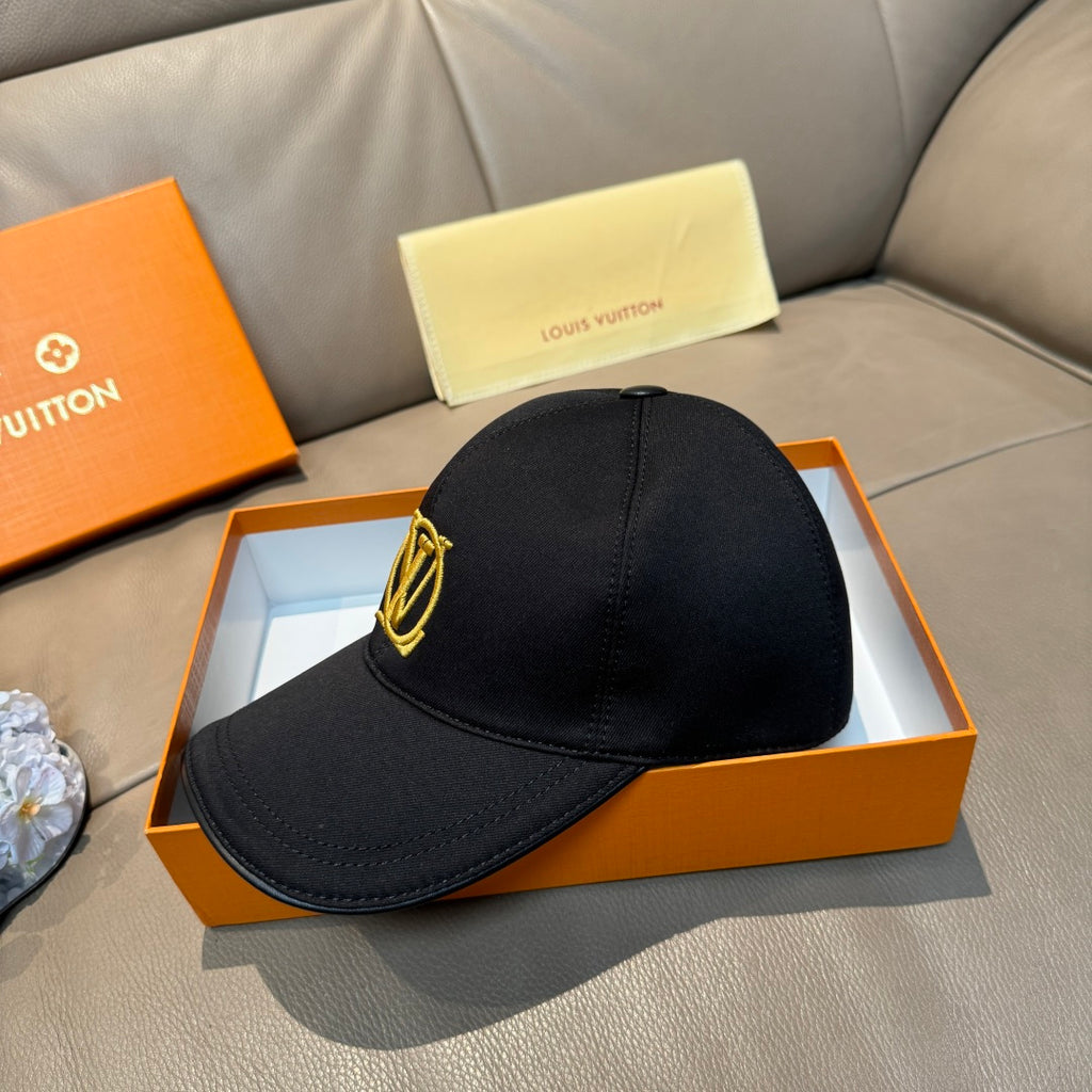Louis Vuitton black baseball cap with raised gold LV logo, side view