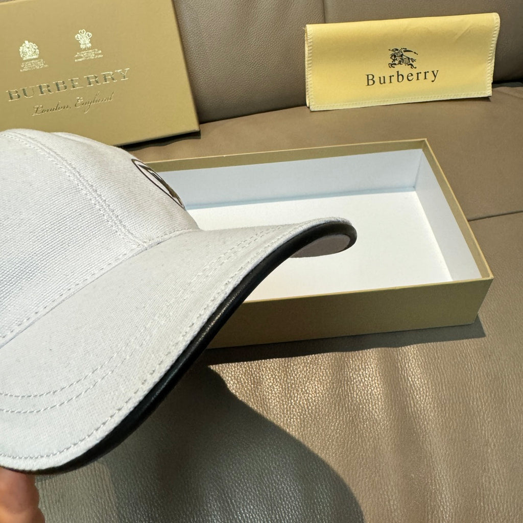 Light blue baseball cap brim close-up with contrast trim along edge