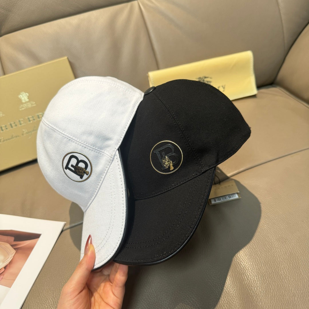 Two-tone baseball cap with white front panel and black crown, circular logo badges