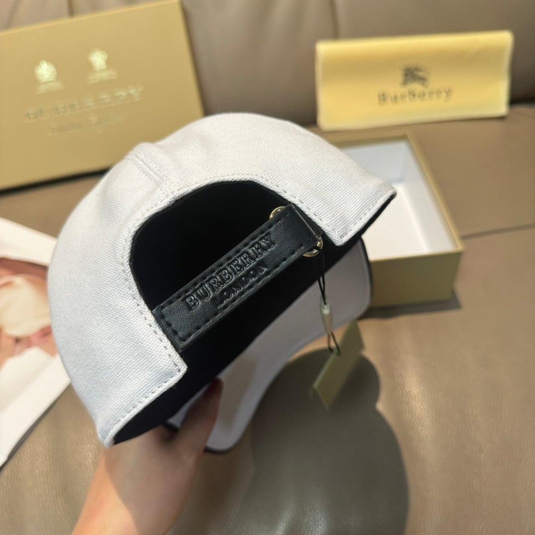 Light blue baseball cap interior with black band and printed logo strap