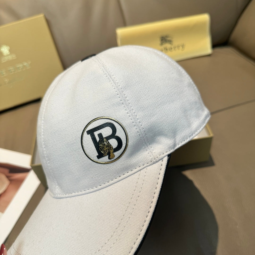 Light blue baseball cap with circular logo patch and curved, stitched brim