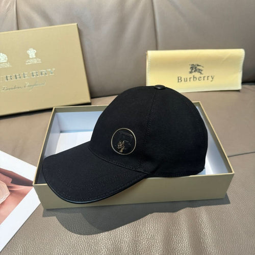 Black Burberry baseball cap with round logo patch on the front.